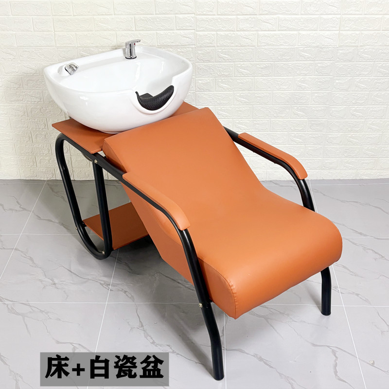 Lavabo de porcelana naranja y blanca