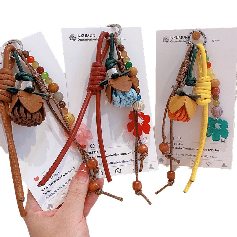 HD9217A04 cadena 05 estrellas otoño y invierno con la misma bola de flores de cuero PU llavero de coche colgante bolso colgante