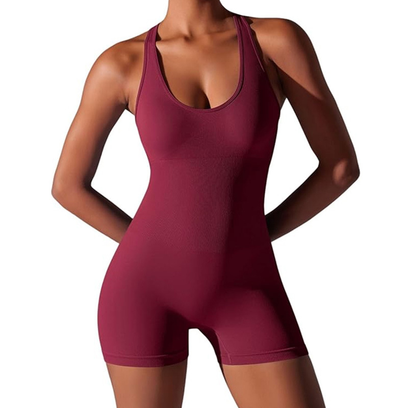 Nueva ropa de yoga europea y americana, mono de una pieza de color sólido ajustado, hermosa espalda aérea, mono de yoga transpirable sin costuras