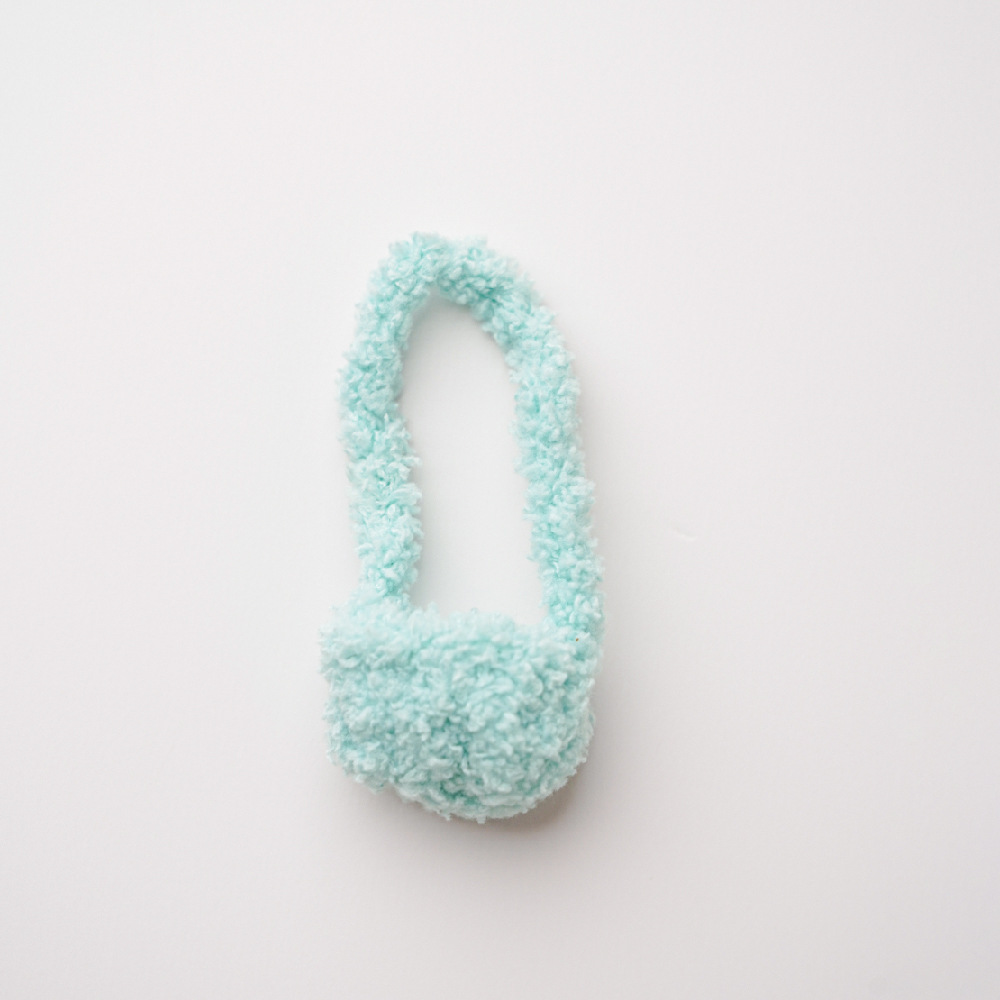Small green velvet bag