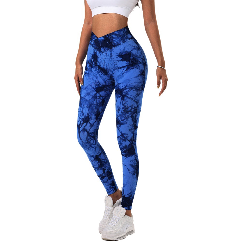 Nuevo europeo y americano sin costuras de cintura alta deportes Levantamiento de cadera de secado rápido pantalones de fitness apretados de las mujeres corriendo melocotón pantalones de yoga teñidos con lazo