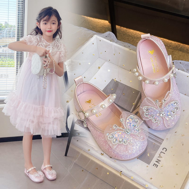 Zapatos de cuero para niñas 2025 nuevos zapatos de princesa con lazo de diamantes de imitación para niños zapatos individuales de moda para niñas zapatos de rendimiento de suela blanda