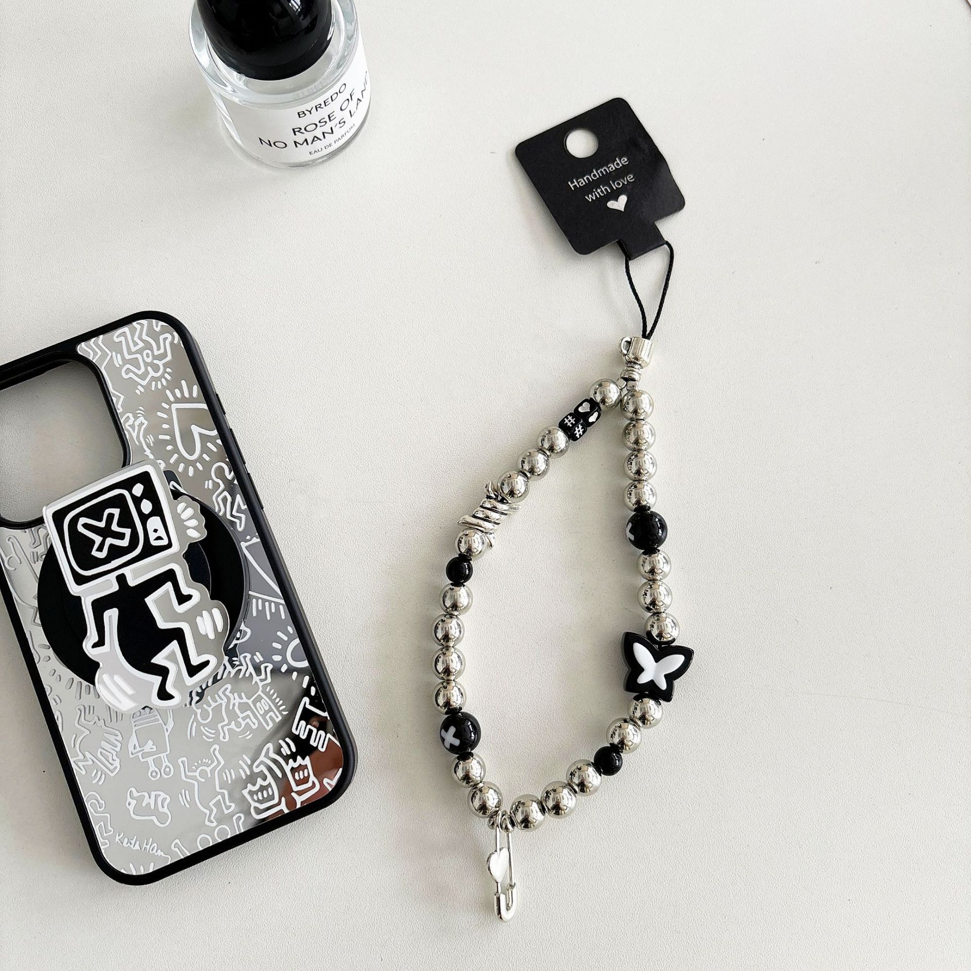 Cuentas de perlas hechas a mano, cadenas de teléfonos móviles, bolsos, colgantes, colgantes de muñeca, cuentas hechas a mano.