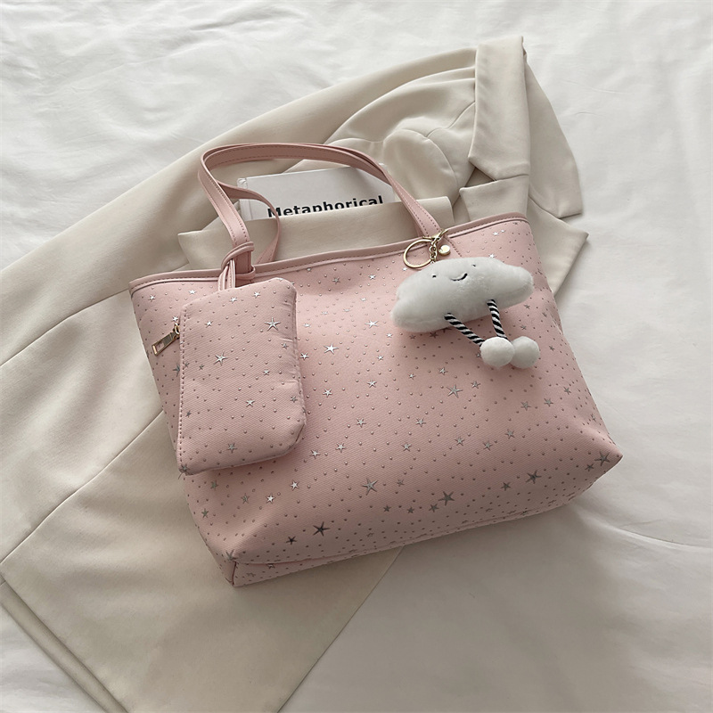 2026 primavera nueva bolsa de hombro de gran capacidad bolsa de brazo universal tendencia transfronteriza dulce viento bolso de mano bolso de mujer