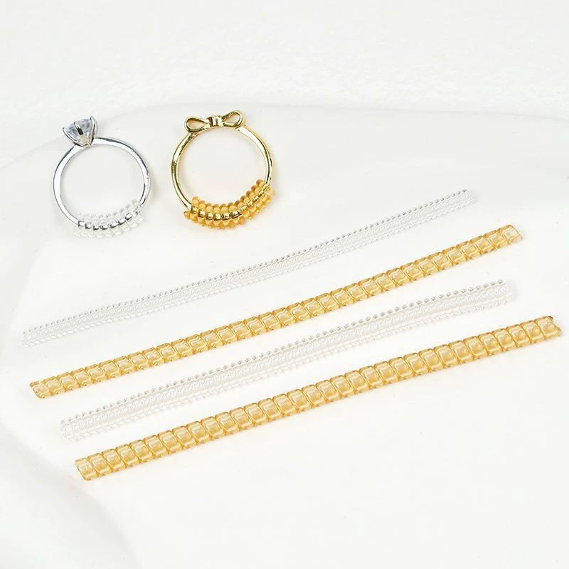 Многофункциональный регулятор размера кольца для международной торговли, прозрачный пружинный шнур, невидимый регулятор размера кольца из полиуретана, теперь доступен для оптовой продажи.