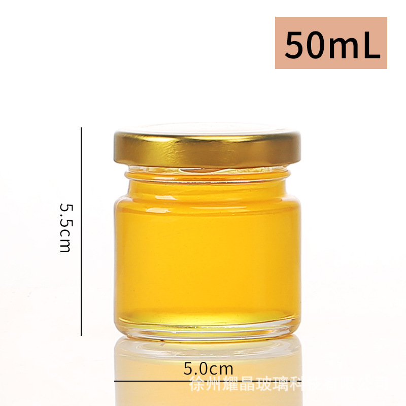 Botella de vidrio redonda de grado alimenticio, botella enlatada transparente sellada, botella de salsa de chile vacía, botella de miel con tapa para cocinar