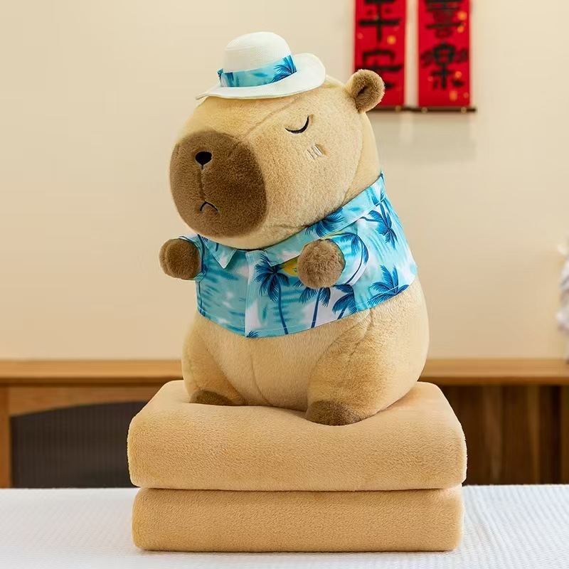 Caricatura capibara almohada manta dos en uno Carpibara cojín aire acondicionado es de doble uso niños siesta manta regalo