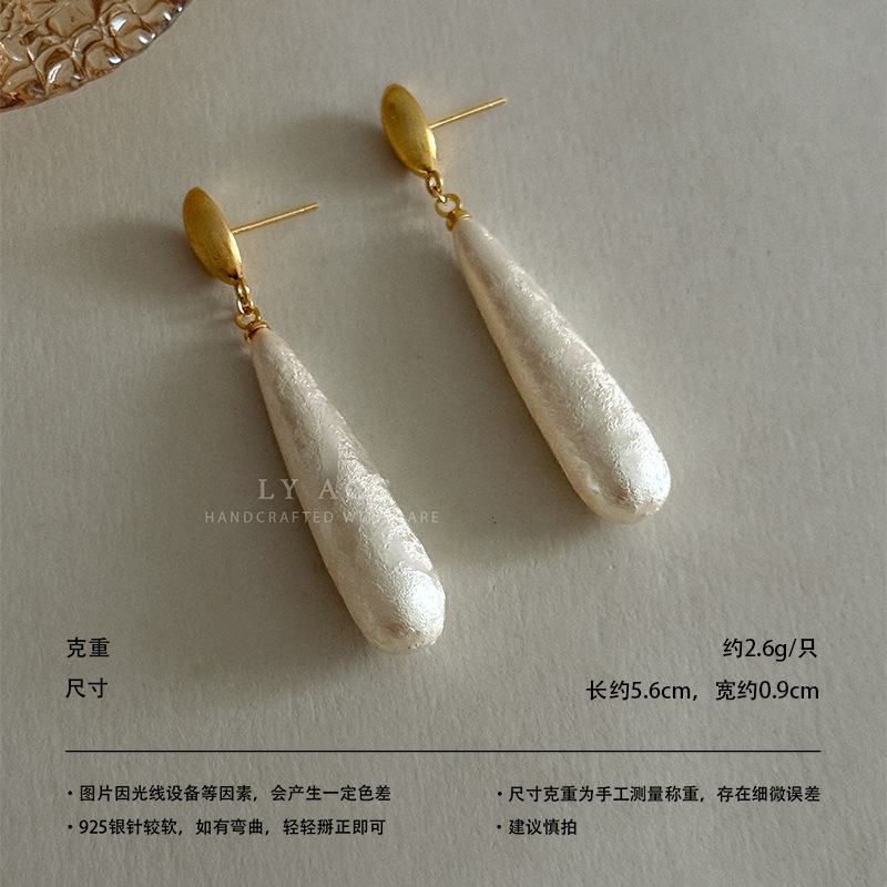 Nuevo estilo chino retro atmósfera cálida y suave nuevo estilo de moda aretes de aretes de borda vestido de algodón perlas largas aretes de aretes de arete de arete de arete