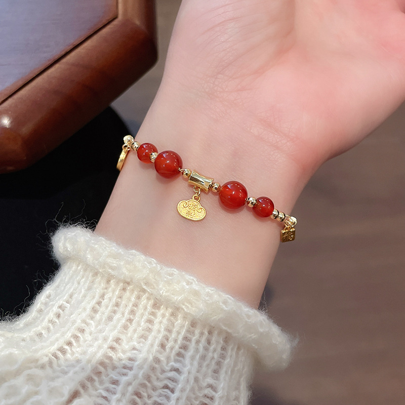Pulsera de granate de ojo de tigre de cristal natural, nueva pulsera de todo fósforo de estilo nacional de estilo chino, joyería de novia de alta gama de lujo ligero