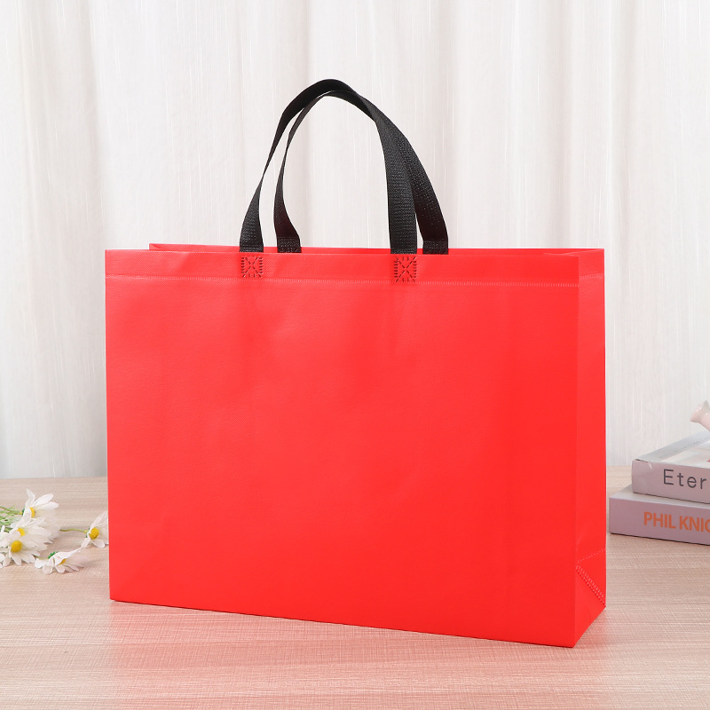 Bolsa de mano no tejida de color spot bolsas de compras de mano en blanco engrosadas logotipo publicitario impresas bolsas no tejidas image 6