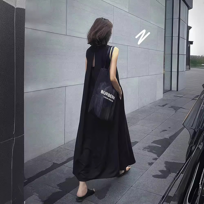 2025 新しいフレンチヘップバーンスタイルの女性のための夏のシックでユニークな黒の背中中空ノースリーブベストドレス|undefined