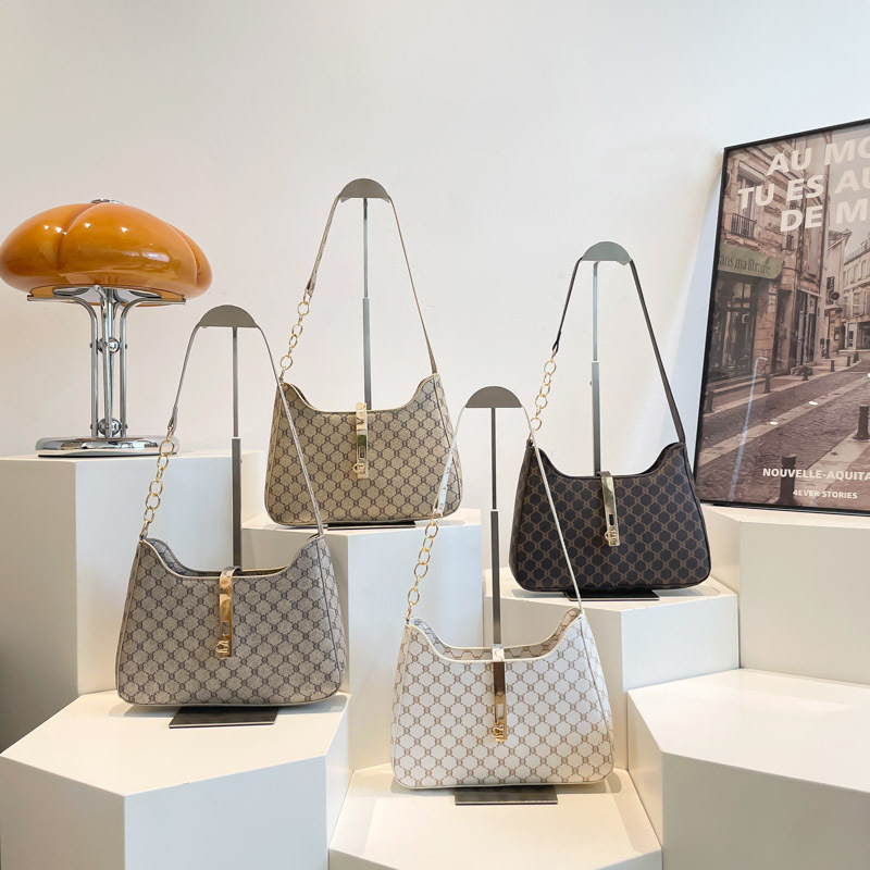 Bolsos de impresión simple debajo de la axila para mujeres 2025 nueva personalidad bolsas de bolsas de bolsas de moda bolsas de hombro casuales