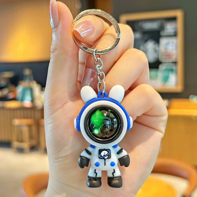 Nuevo astronauta cielo estrellado conejo llavero pvc llavero de goma suave bolsa de pareja colgante de muñeca tridimensional al por mayor