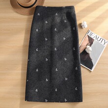 高档黑色羊绒半身裙女2025年秋冬新款绝美巨好看羊毛呢a字包臀裙