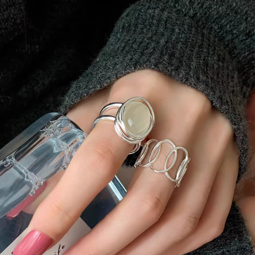 Korean style ring female personality niche egg white stone pigeon egg ring cold style simple versatile hollow line ring