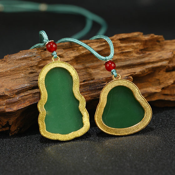 Imitation gold inlaid jade Guanyin Buddha pendant men's and women's emerald sweater chain will sell gifts stall live supply wholesale