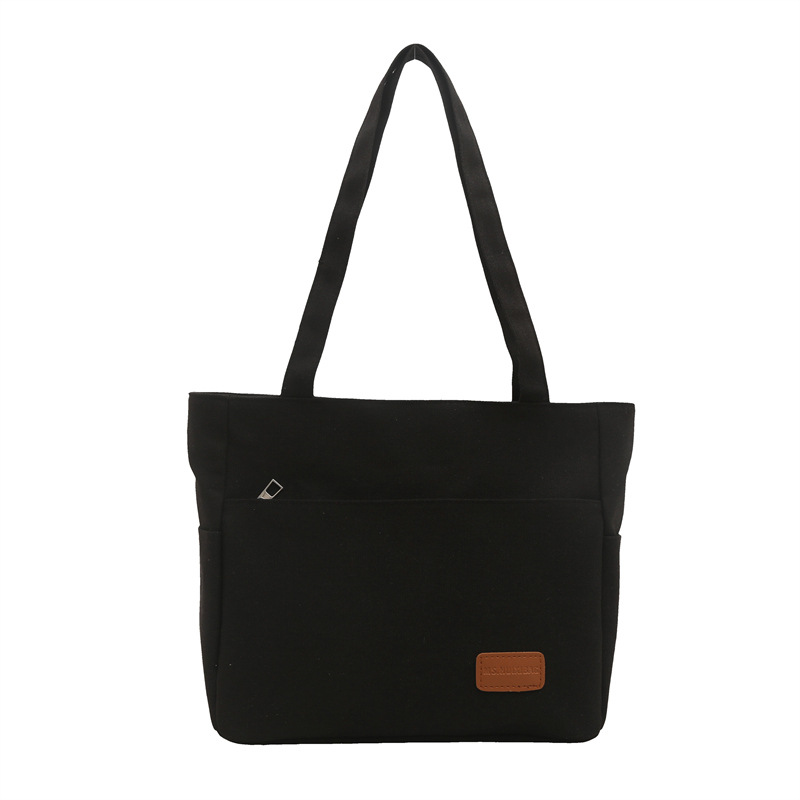 Bolsa de lona de alta capacidad para mujeres japonesas simple versátil bolso de hombro de viaje de estudiantes bolso especial