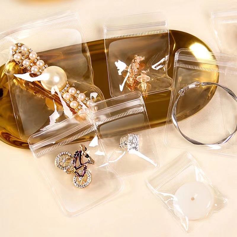 Bolsa transparente de PVC engrosada y antioxidante para pendientes, collares, anillos, almacenamiento de joyas, bolsa autosellable, bolsa de embalaje para sellar joyas