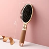 Oval comb