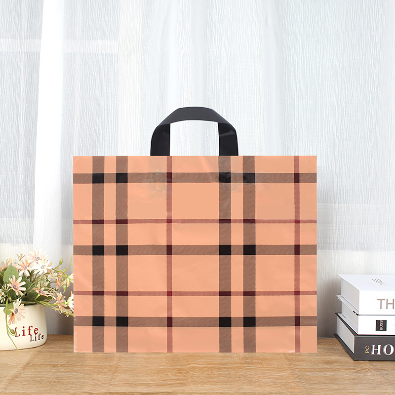 Tienda de ropa de suministro de fábrica bolso transparente logotipo impreso bolsa de embalaje de regalo bolsa de plástico de embalaje de ropa al por mayor