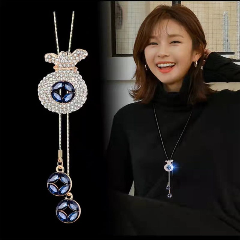 Colar longo com pingente amuleto em strass e tassel_voghion.com