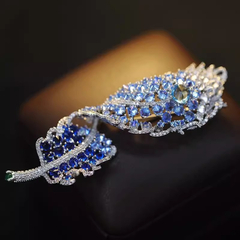 Spilla in piuma di lusso per donna elegante accessorio per cappotti_voghion.com
