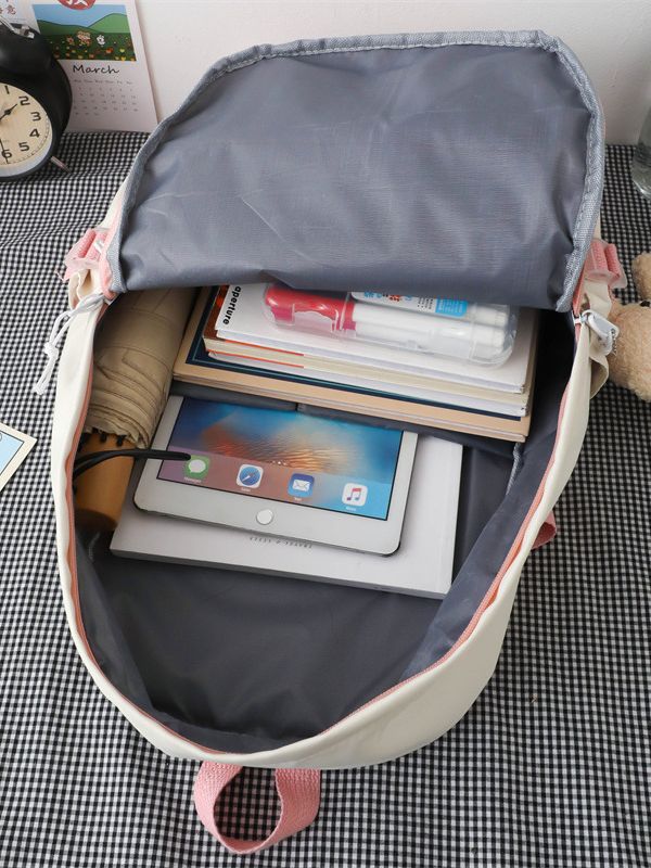 Colores contrastantes universales estudiantes japoneses mochila escolar de gran capacidad universitaria mochila de ocio de viento herramientas mochila de hombro al por mayor