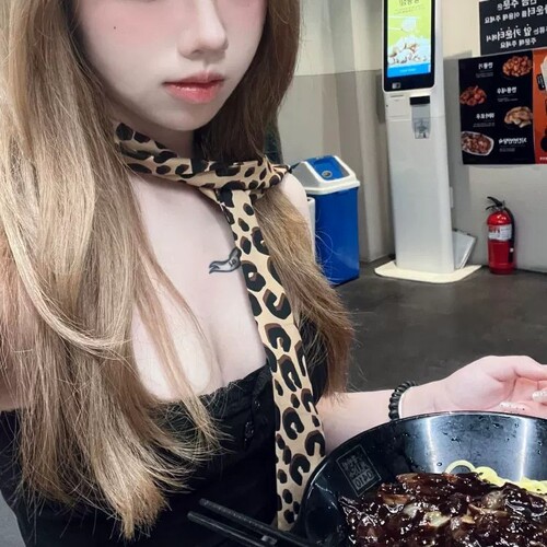 Elevated, versatile leopard and polka-dot silk scarf: a retro, edgy 