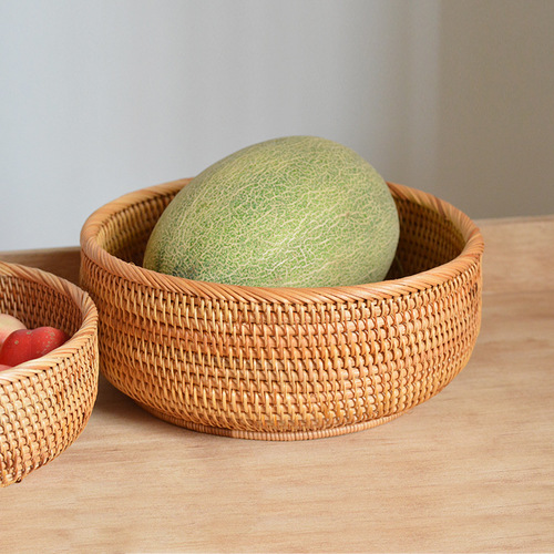 Factory direct sales wholesale Vietnamese rattan fruit plate storage basket desktop coffee table sundries small round snacks dried fruit storage