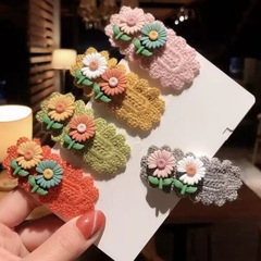 子供の花のヘアピンが可愛いです。