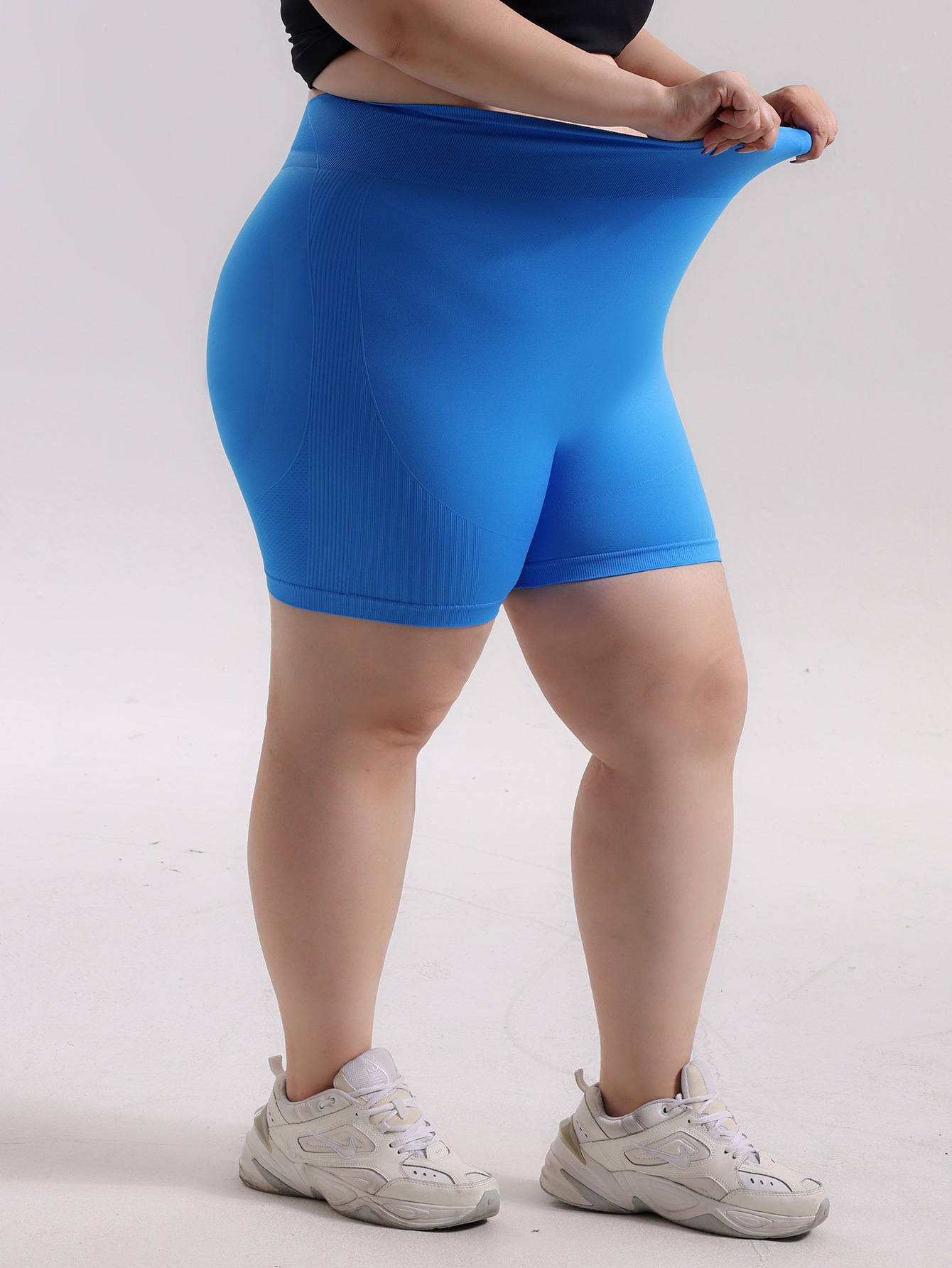 Pantalones cortos de cadera de melocotón deportivos sin costuras de gran tamaño europeos y americanos