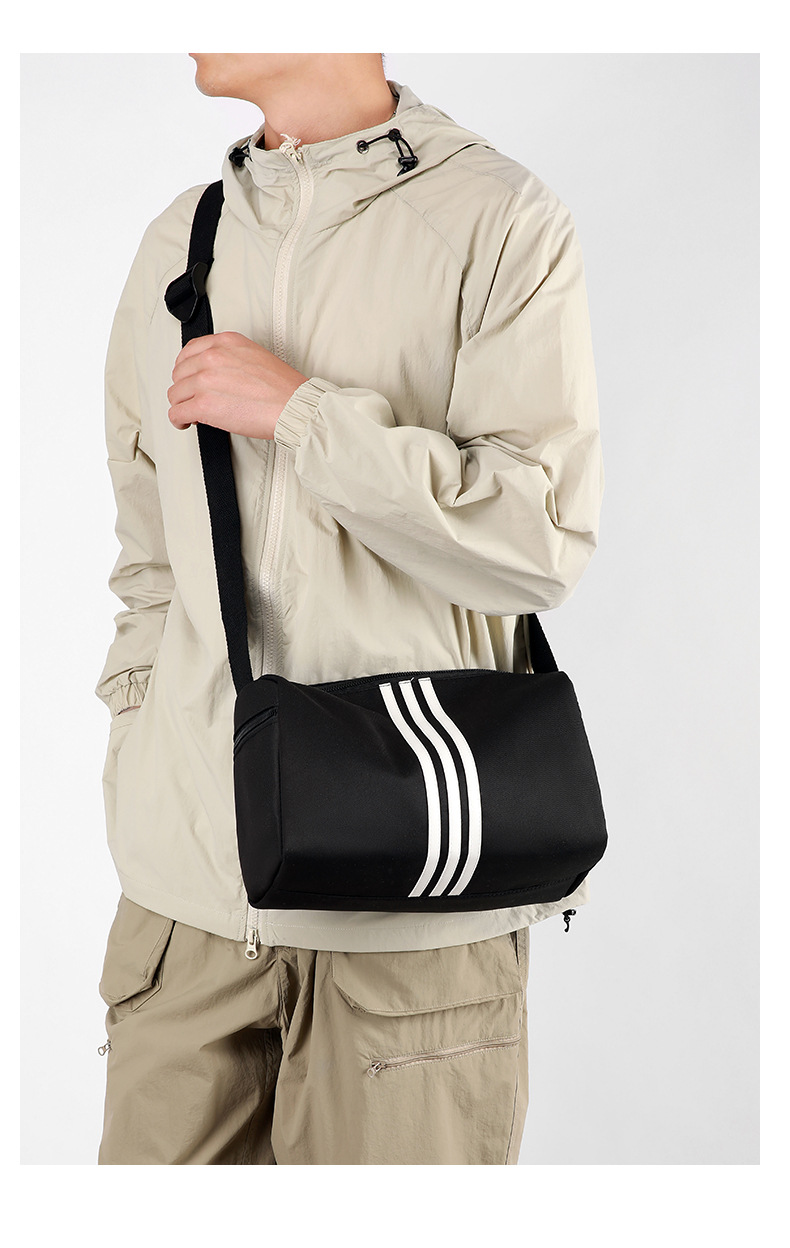 This is a simple, fashionable, casual and versatile crossbody bag for women, suitable for commuting. It is a large-capacity striped single-shoulder bag for both men and women undefined