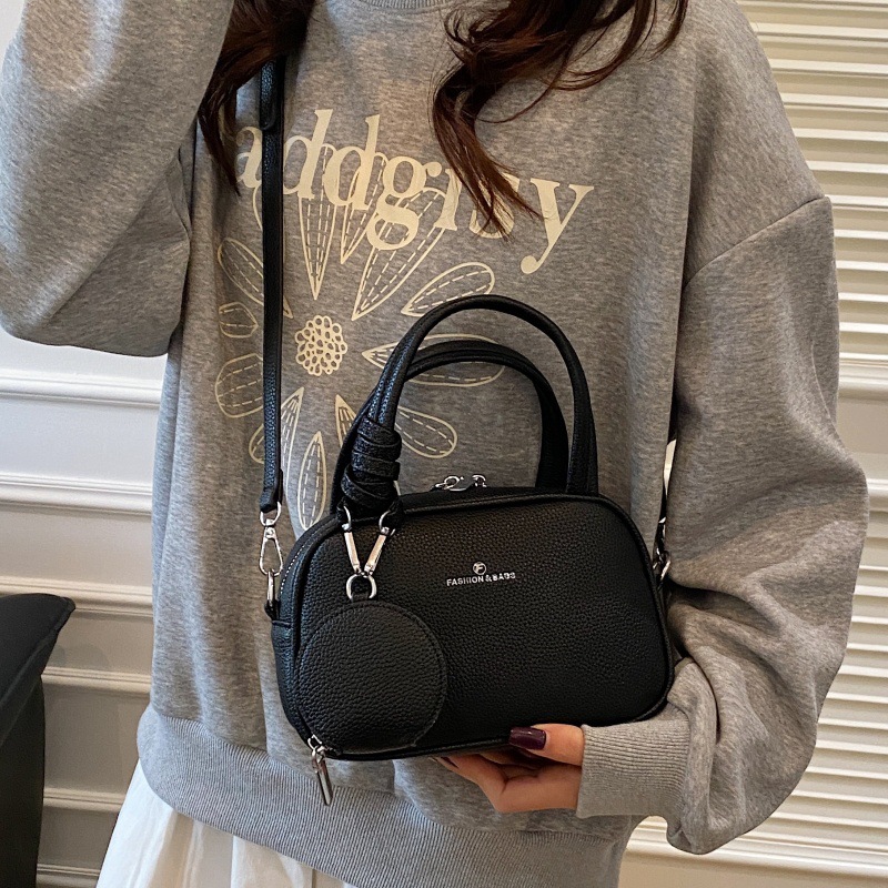 Bolso de moda coreano 2025 primavera y verano nuevo bolso femenino bolso de hombro con patrón de lichi simple bolso de mensajero de letras casuales