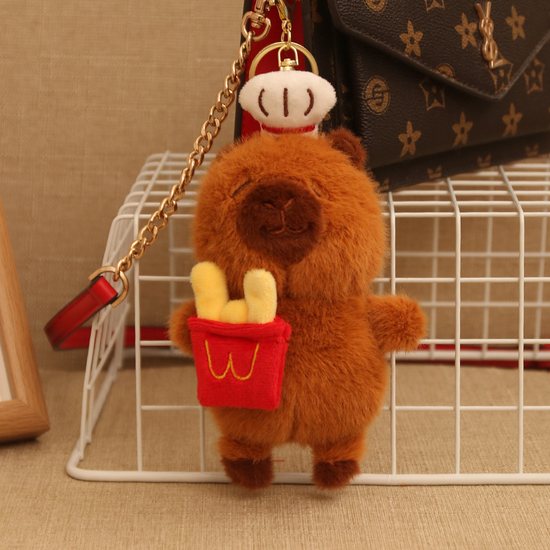 Creativo lindo pan de papas fritas felpa Kapibala colgante hamburguesa carpincho muñeca colgante pequeño llavero