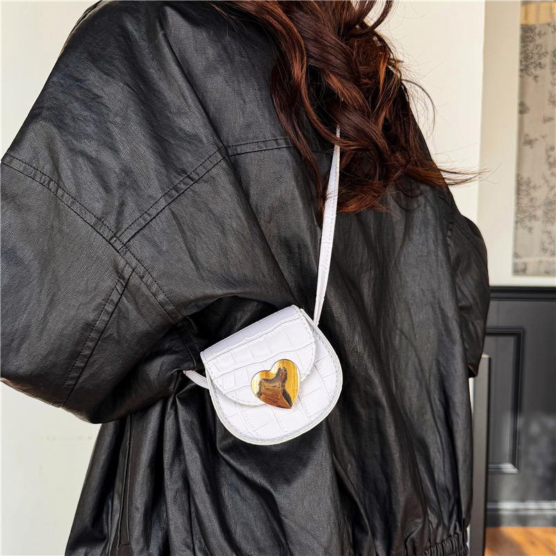 Coreano estilo extranjero piedra patrón bolso de hombro para hombres y mujeres, mini amor para padres e hijos mochila, bolso de moda para niños.