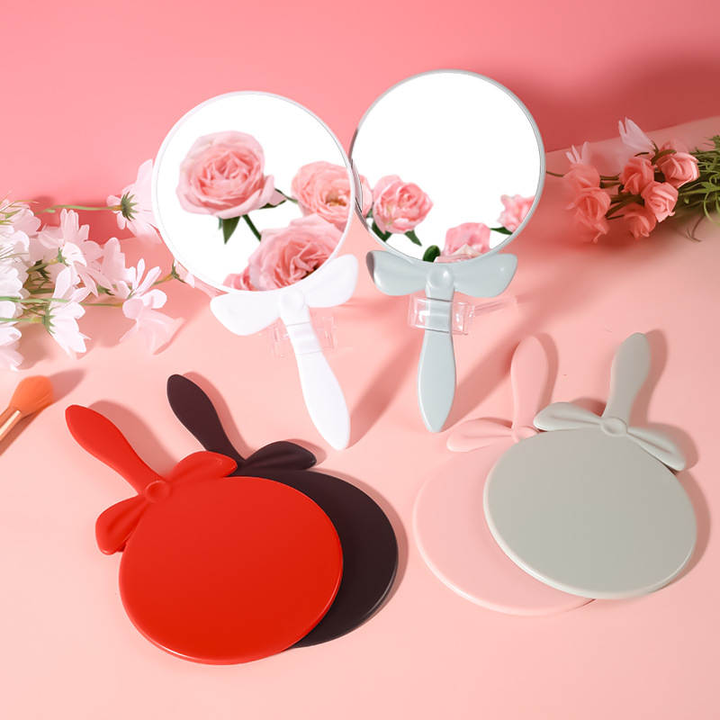 Espejo de maquillaje con mango en arco | Diseño creativo, personalizable con logo, venta al por mayor