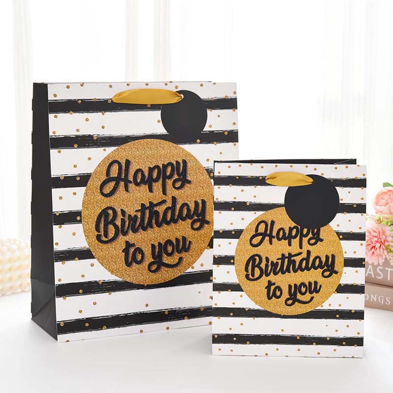 Nueva bolsa de regalo de cumpleaños transfronteriza, bolsa de mano de bronceado de alta gama, bolsa de embalaje de regalo, bolsa de papel portátil al por mayor