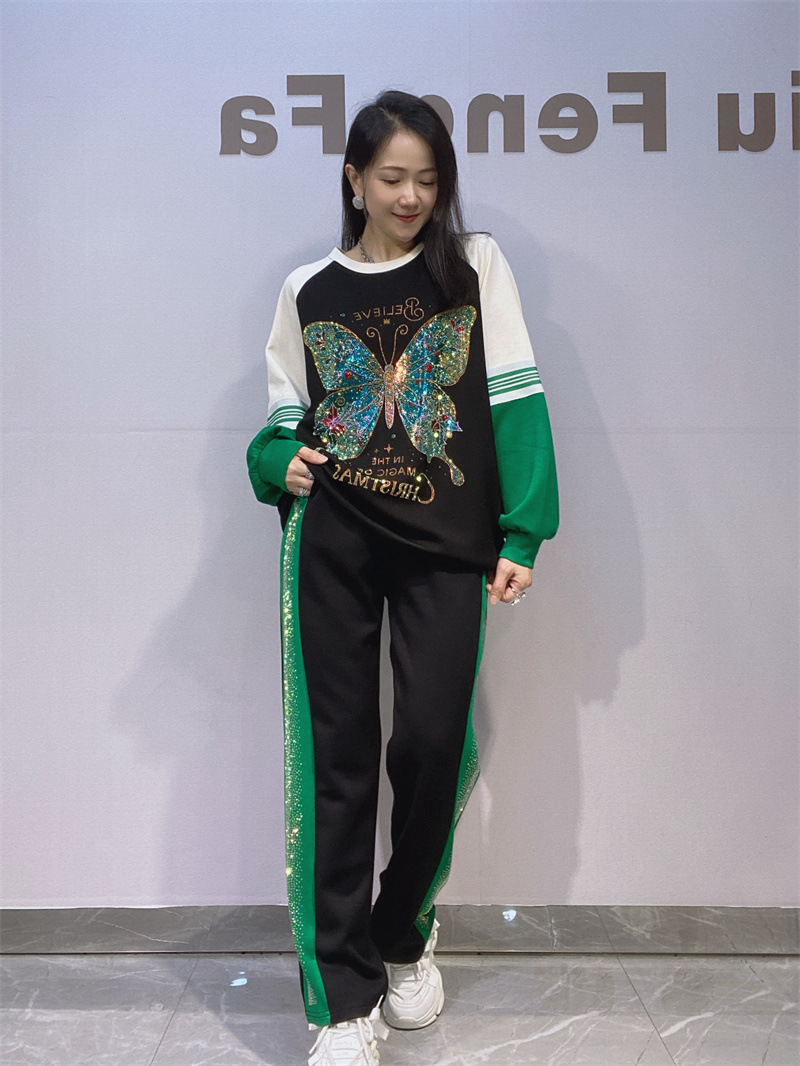 Trajes europeos de otoño de hombros de cuello redondo chaqueta de mangas largas pantalones largos trajes deportivos con diamantes de dos piezas