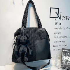 カジュアルなバッグのネット布に皮を合わせたシングルショルダーバッグ
