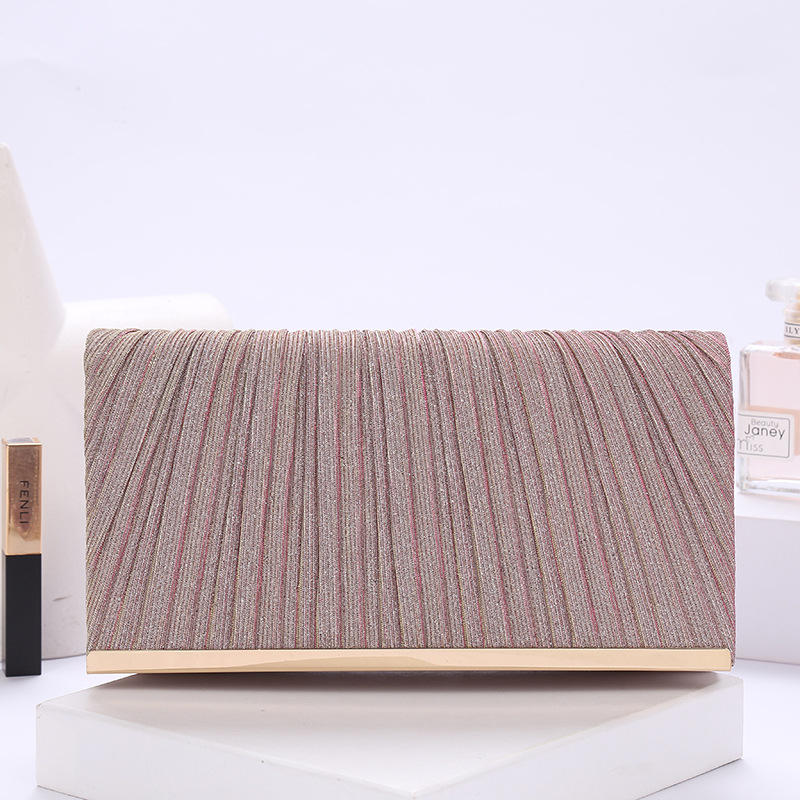 Foreign trade hot summer South Korea clutch personalized sequins Joker party dance wedding women's bag a generation of hair