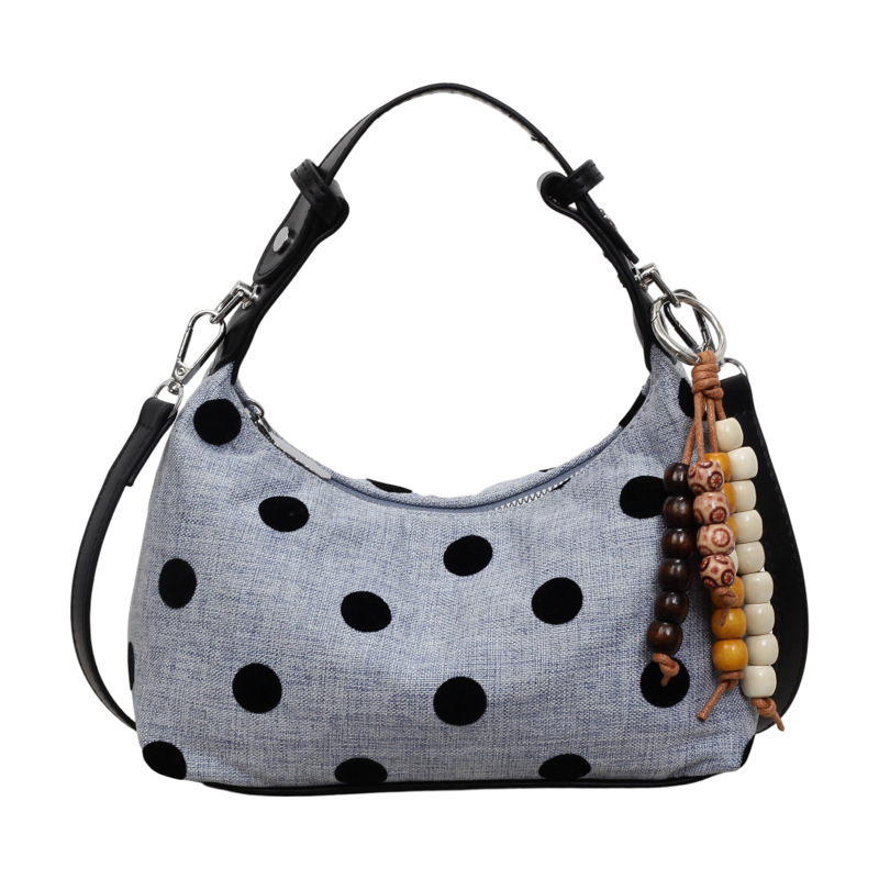 Bolsa de mano de lino ultra caliente, punto de onda, mujer 2026 nuevo nicho Zhongxiao universal, mochila de hombro para viajar