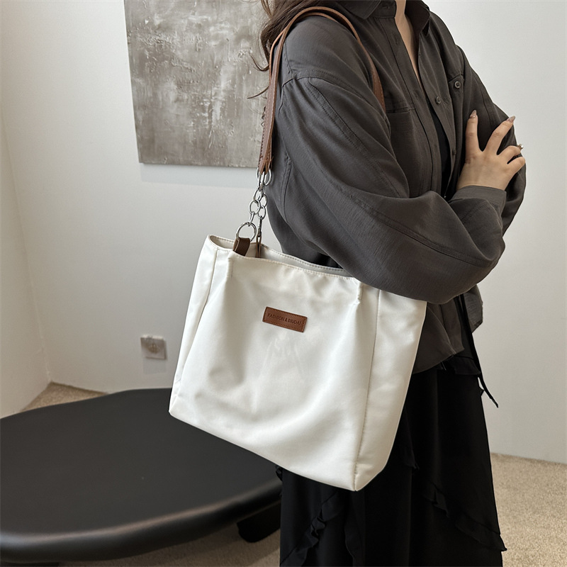 Casual bolsa de viaje de gran capacidad para mujeres 2024 nueva moda bolsa de lona universal bolso de hombro universal bolso simple