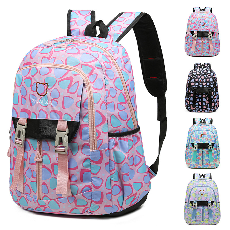Fábrica al por mayor nueva mochila escolar de estudiantes de primaria y secundaria, mochila ligera de ocio de gran capacidad, mochila de viaje de bolsillo