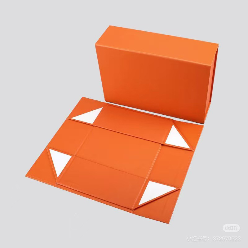 Caja de regalo plegable transfronteriza de una pieza comercio exterior caja de embalaje de absorción de tapa plana caja de libro personalizada caja de regalo