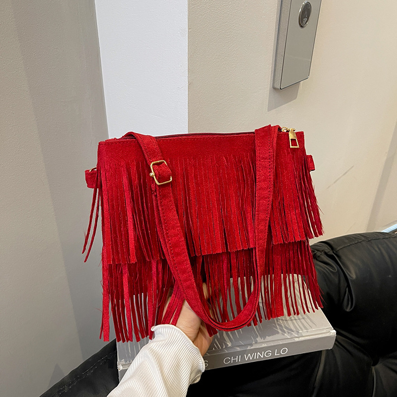 2025 Winter New Bohemian Tassel Bag Fashion Ethnic Style Retro One-Shoulder Crossbody Women's Bag Mobile Phone Bag 2025 Winter New Bohemian Tassel Bag Fashion Ethnic Style Retro One-Shoulder Crossbody Women's Bag Mobile Phone Bag
