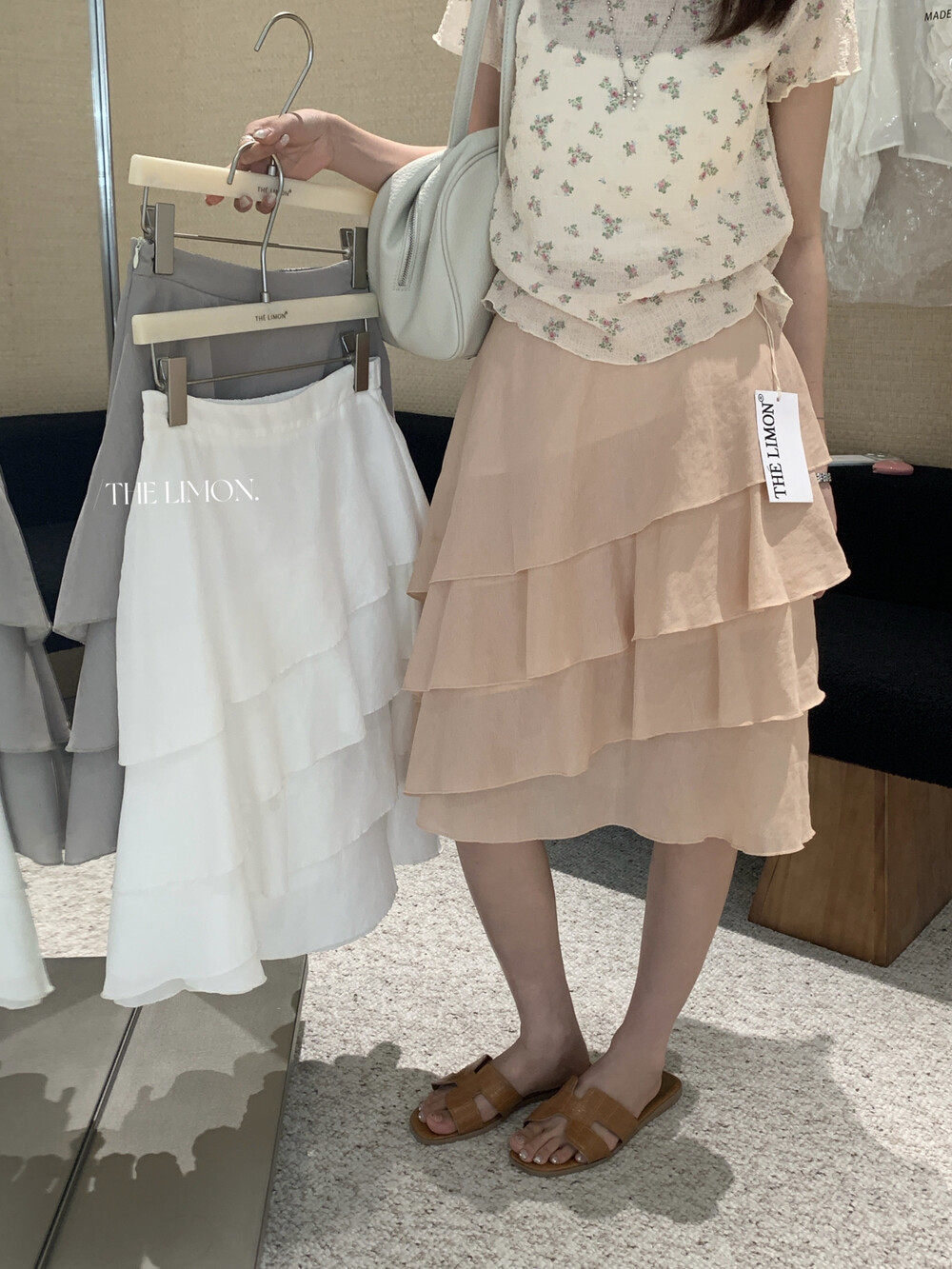 Chân váy midi xếp ly tầng bất đối xứng chất liệu Tencel — màu trắng, Bột cam, màu xám chi tiết 13