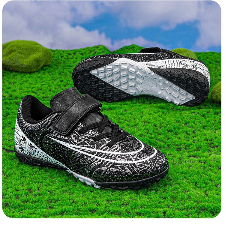 Zapatos de fútbol para niños con velcro bajo nuevo tipo de zapatos de entrenamiento transfronterizos de entrenamiento profesional de estudiantes de fútbol con clavos largos