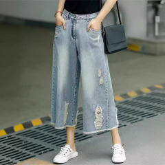 レトロな古い穴のジーパンの女性の夏の薄いタイプの腰のゆったりしている広腿のズボンの女性の小さい背の7分のカジュアルなズボン