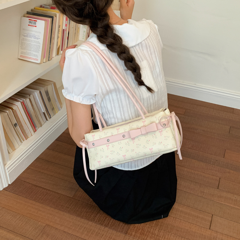 Nicho coreano bolsas de flores trituradas 2026 nueva moda versátil bolsas de brazo sensación diaria bolsas de hombro