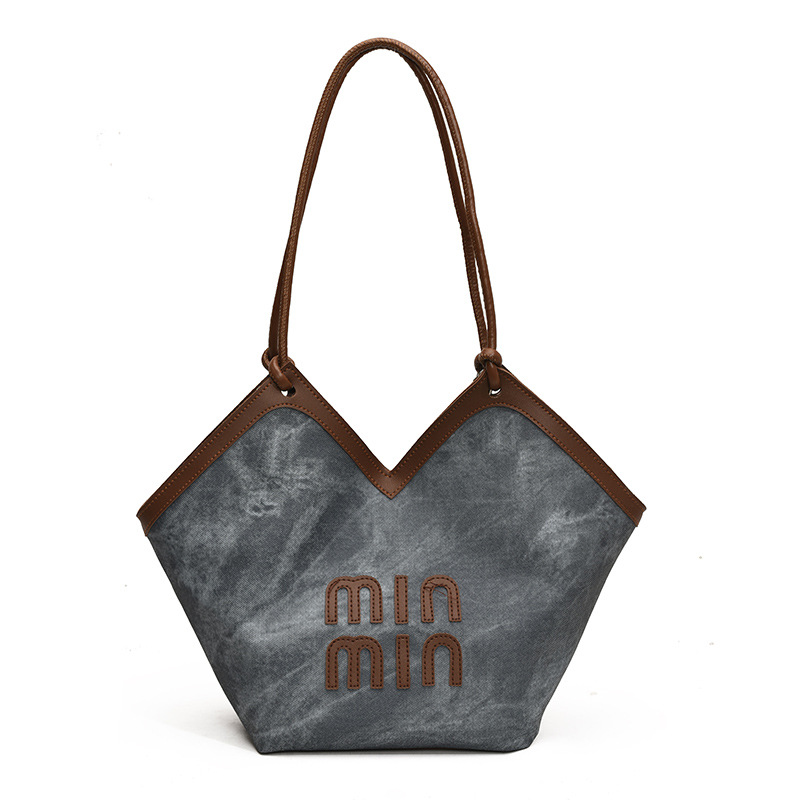 2024 nueva bolsa de gran capacidad para mujeres, bolso de hombro Sen Meng, bolso de diseño de nicho, bolso de viaje de alta calidad para mujeres